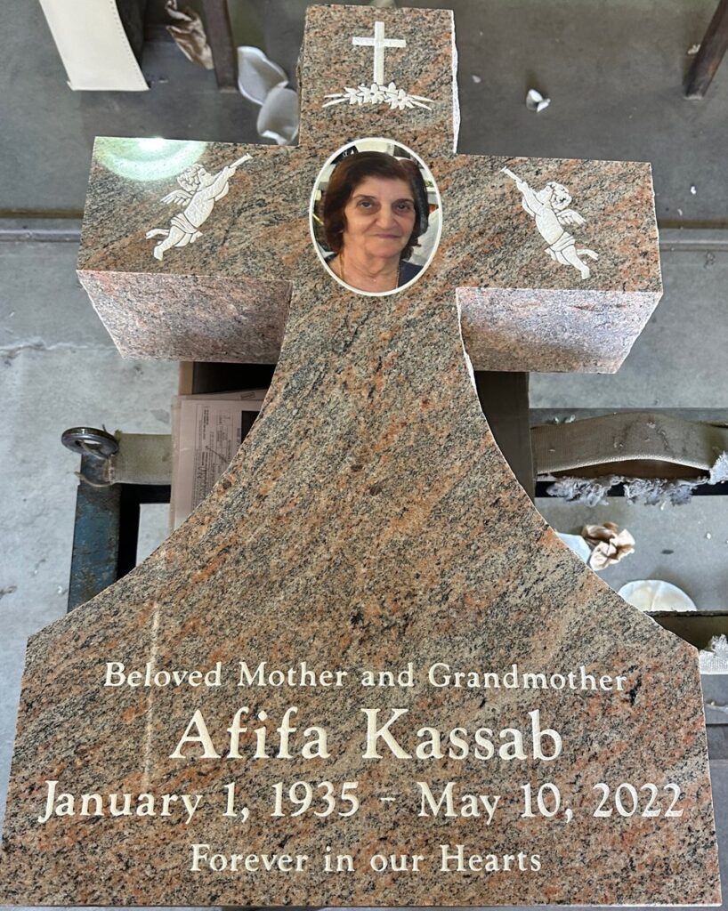 Red Multicolor granite upright monument with cross with cherubs and portrait, Kassab family, Desert View Memorial Park