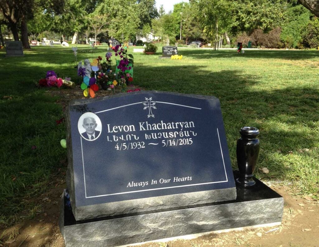 Black granite slant memorial with armenian cross portrait, Khachatryan family, Oak Park Cemetery