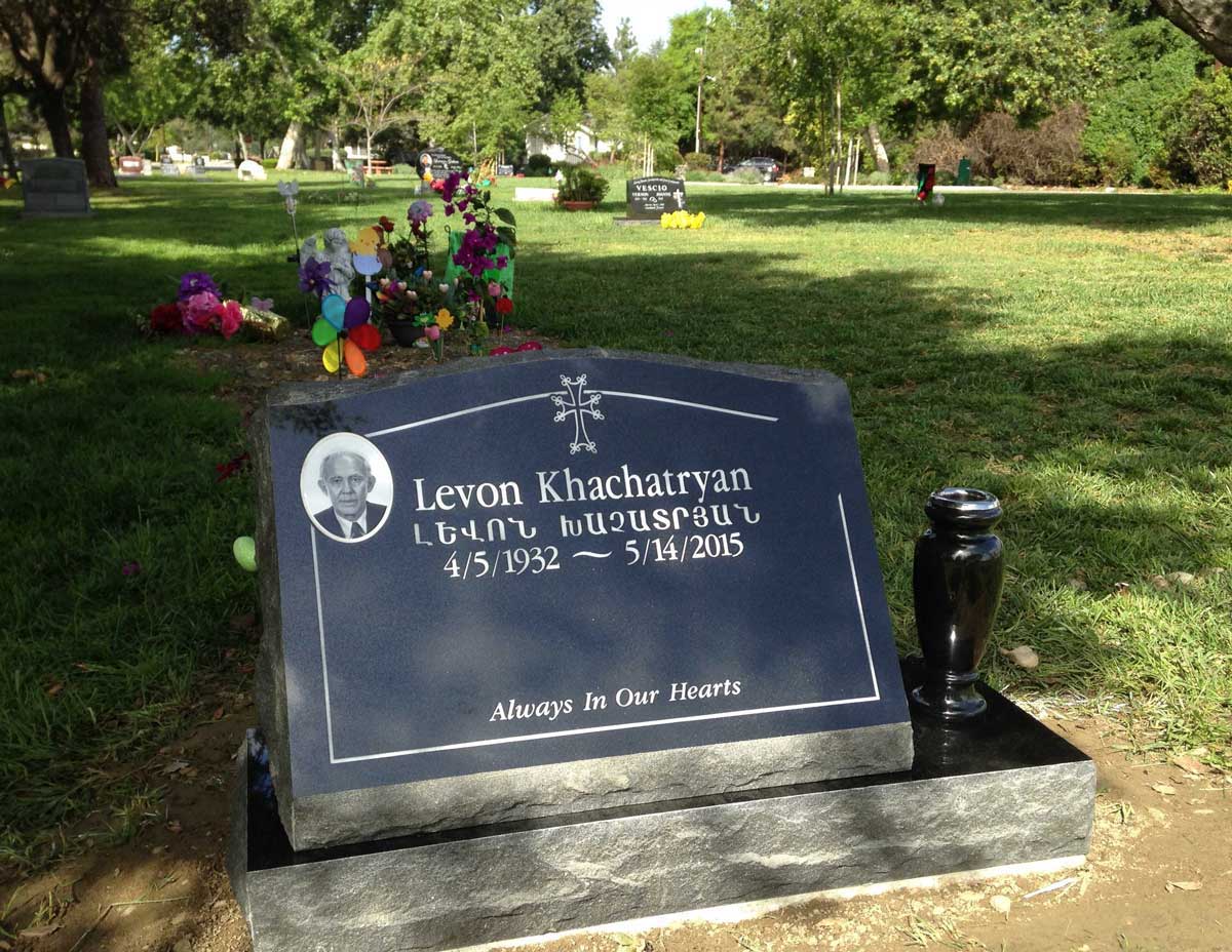 Black granite slant memorial with armenian cross portrait, Khachatryan family, Oak Park Cemetery