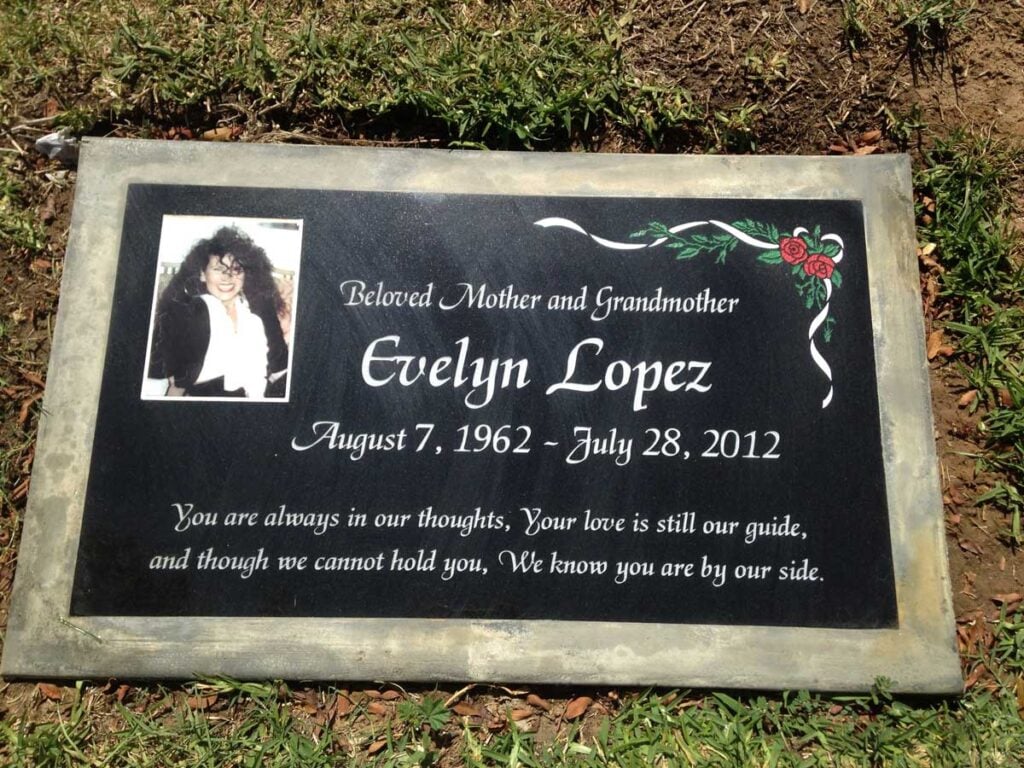 Black granite memorial stone with portrait and roses, Lopez family, Loma Vista Memorial Park