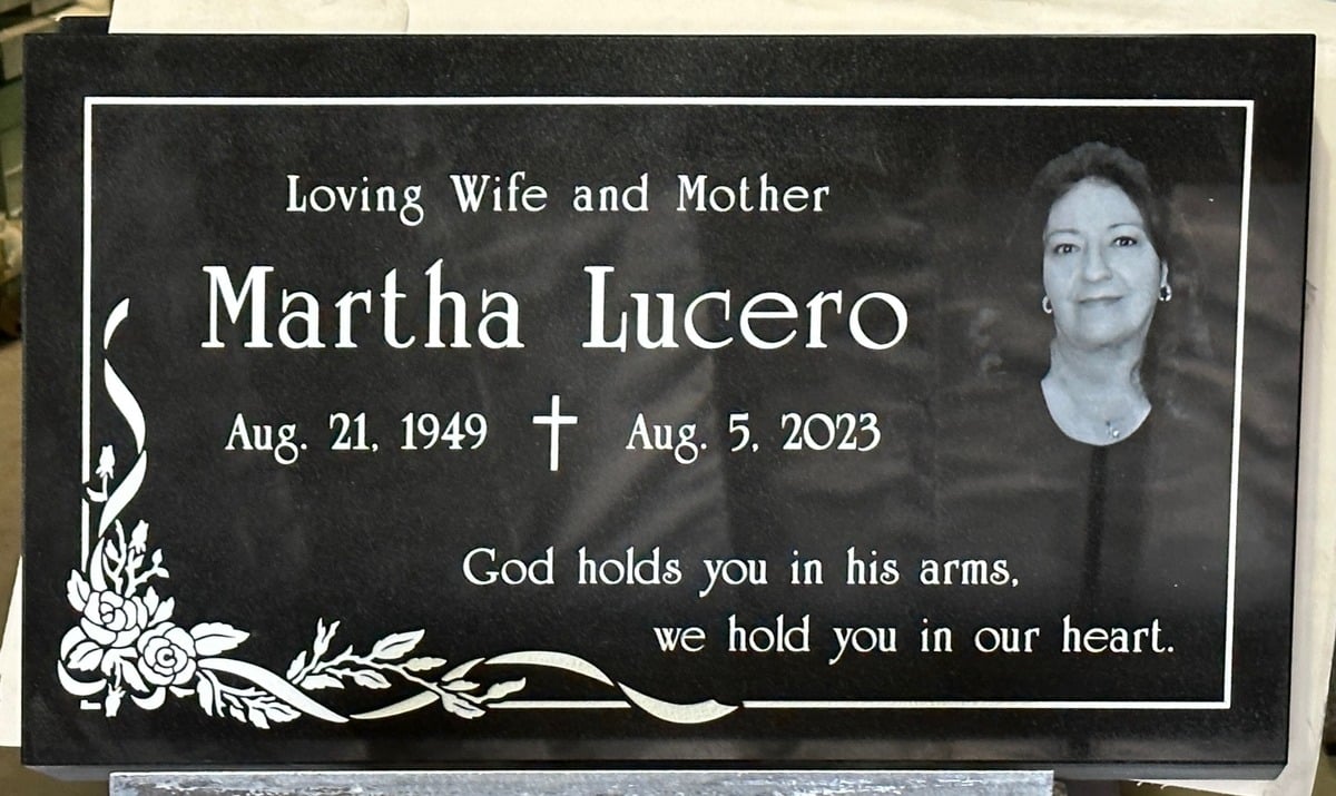 Black granite grave marker with etched portrait and roses, Lucero family, Calvary Cemetery