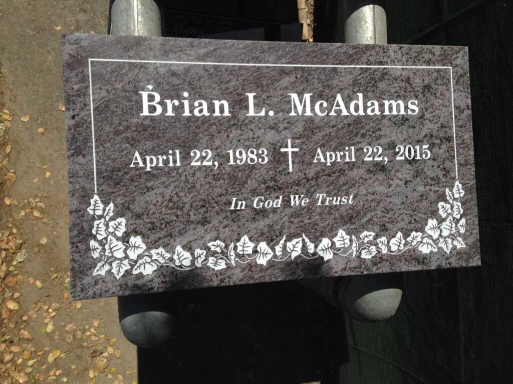 Bahama Blue granite memorial stone with ivy border, McAdams family, El Toro Memorial Park