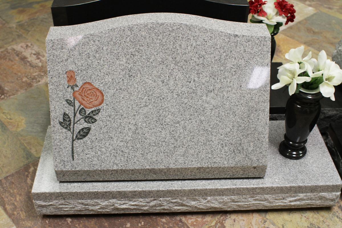 Southern White granite slant memorial with painted red rose
