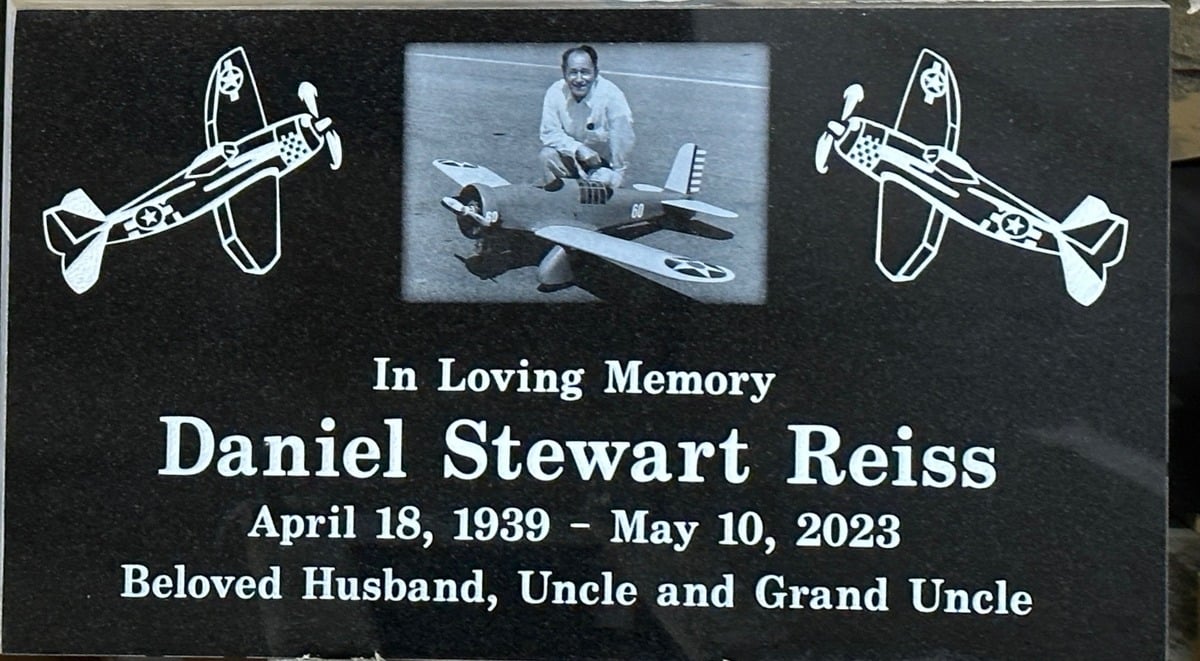 Black granite headstone with model airplanes portrait, Reiss family, Rose Hills Memorial Park