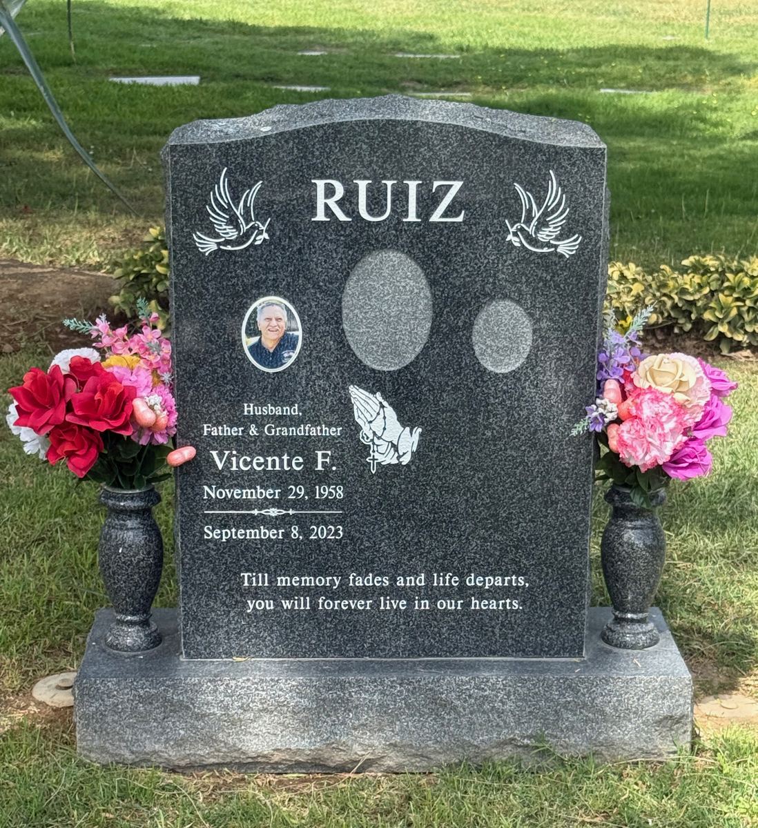 Oxford Gray granite upright monument with doves and praying hands, Ruiz family