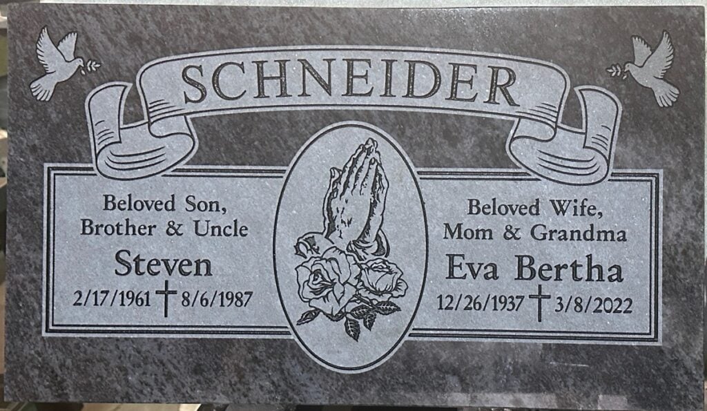 Bahama Blue granite companion grave marker with praying hands and doves, Schneider family, Queen of Heaven Catholic Cemetery