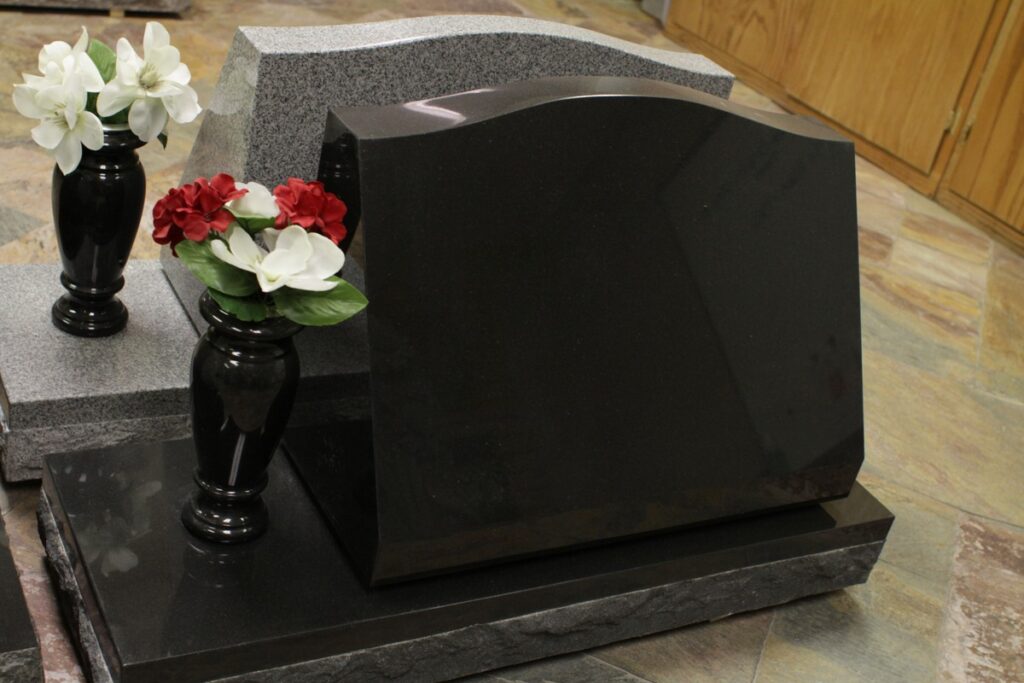 Black granite slant memorial with serp top slant