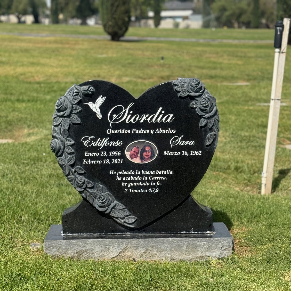 Black granite companion upright monument with heart with sculpted roses, Siordia family