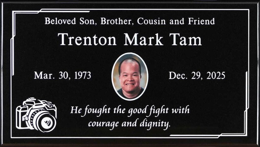 Black granite memorial marker with camera portrait, Tam family, El Toro Memorial Park
