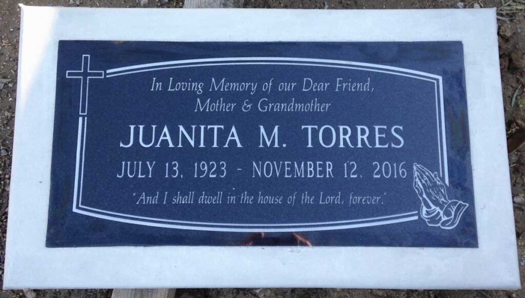 Black granite headstone with cross and praying hands, Torres family, Crestlawn Memorial Park