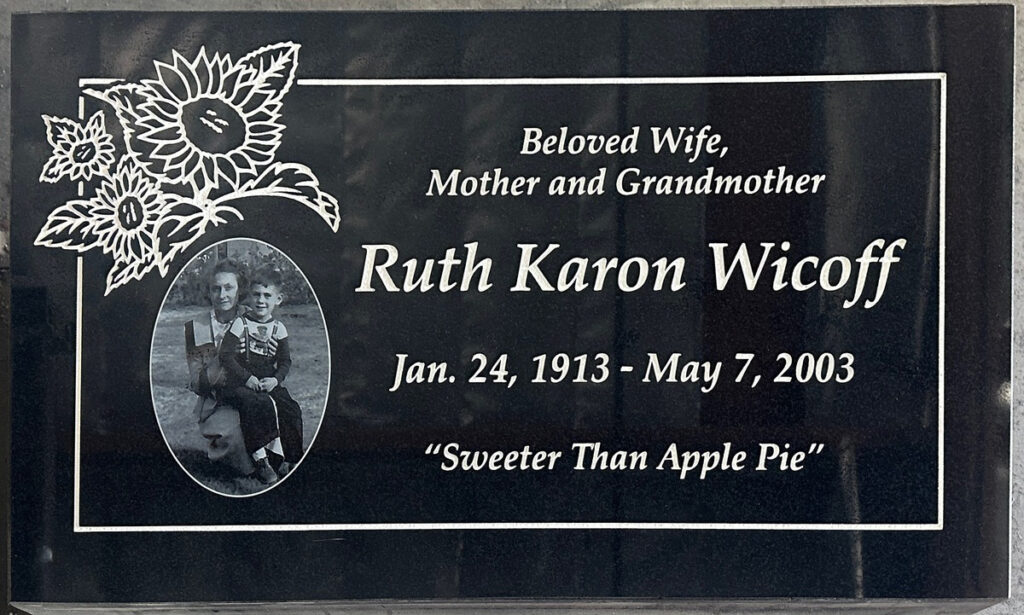 Black granite memorial with sunflowers with portrait, Wicoff family, Oak Park Cemetery