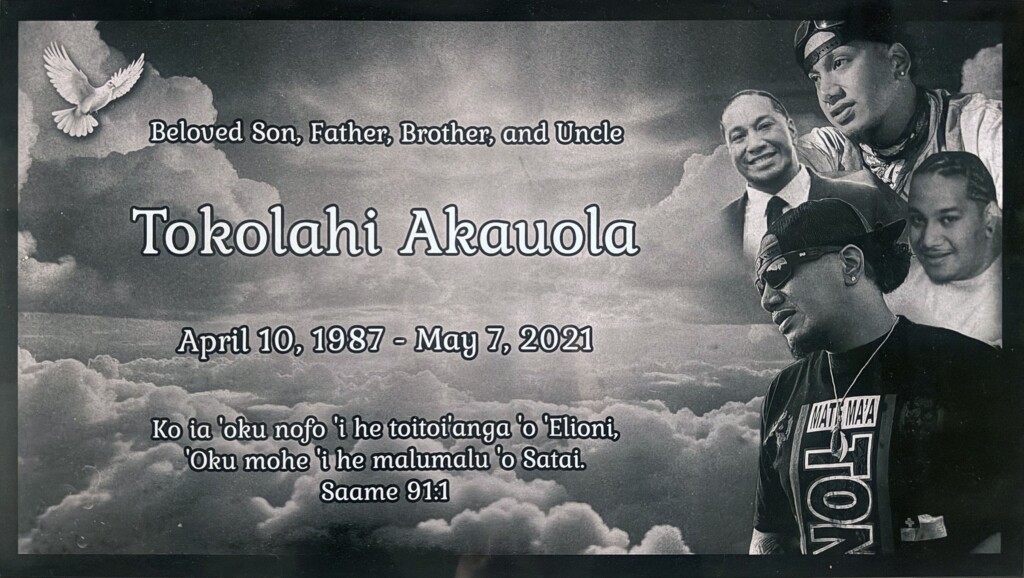 Black granite gravestone with clouds and dove, Akauola family, Bellevue Memorial Park