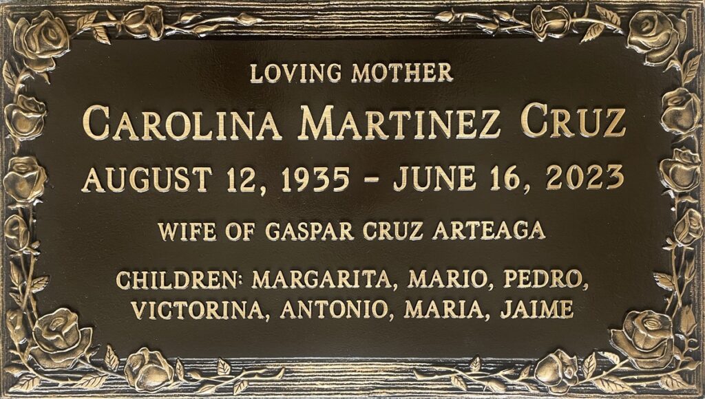 Bronze headstone with rose border, Cruz family, Forest Lawn Memorial Park