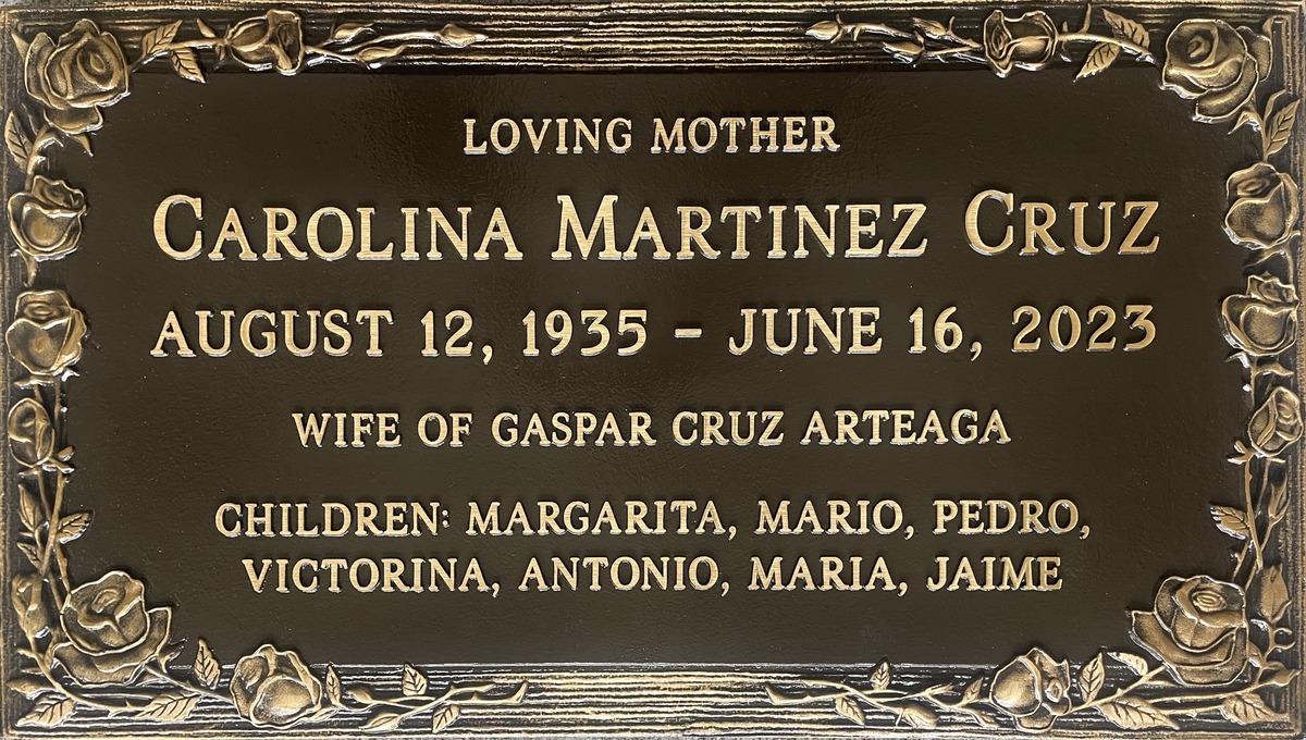 Bronze headstone with rose border, Cruz family, Forest Lawn Memorial Park