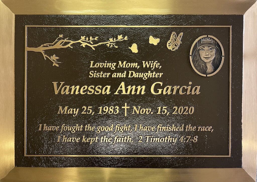Bronze gravestone with tree branch and butterflies, Garcia family, Forest Lawn Memorial Park