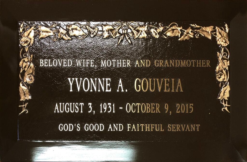Bronze headstone with morning glory border, Gouveia family, Forest Lawn Memorial Park