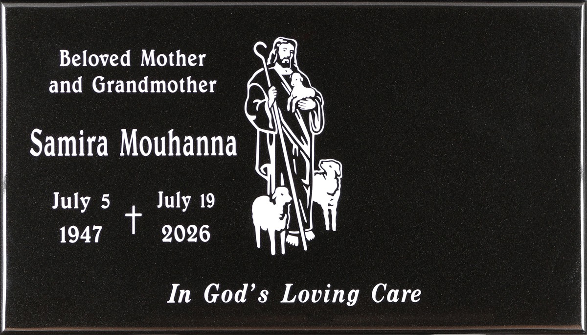 Black granite gravestone with good shepherd and lambs, Mouhanna family, Holy Cross Cemetery