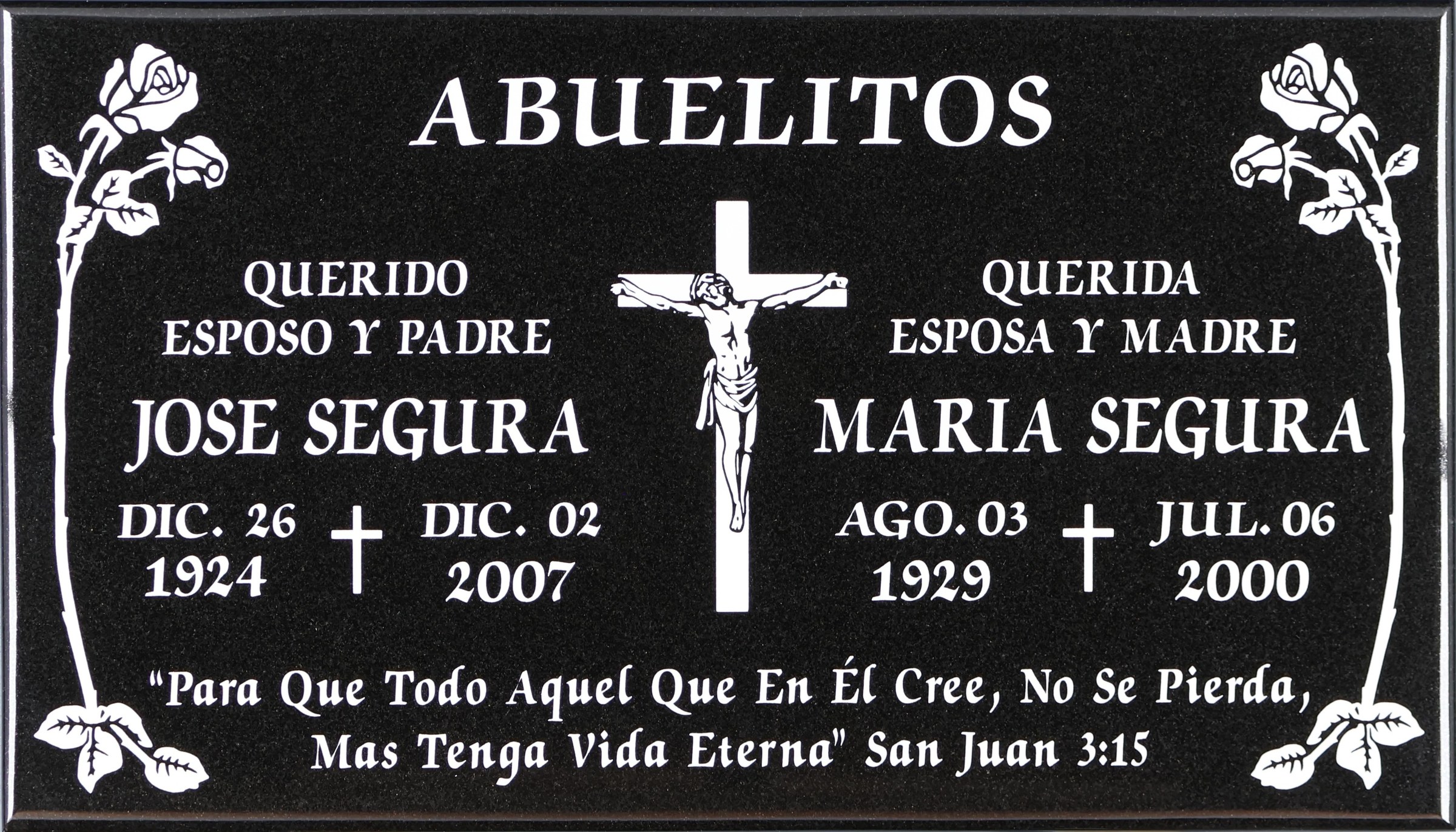 Black granite companion memorial marker with crucifix and roses, Segura family, Holy Cross Cemetery