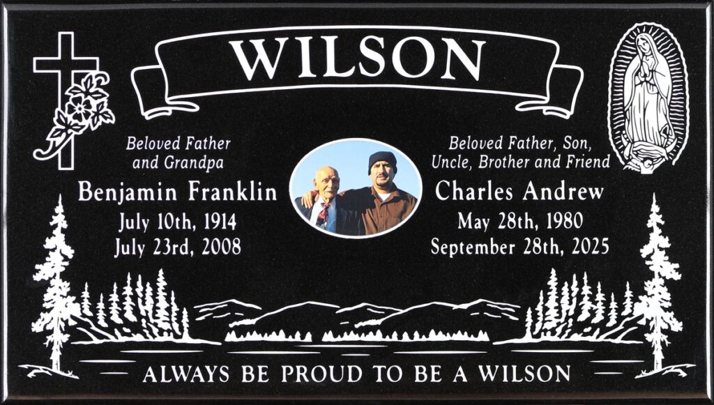 Black granite companion grave marker with mountain lake scene, Wilson family, Holy Cross Cemetery